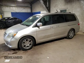 2007 Honda Odyssey Touring z VIN 5FNRL38887B102328, wystawiony jako Copart lot #52113595 z przebiegiem 105 394 mil mil oraz Szkoda całkowita • Salvage title. Historia ofert i sprzedaży dostępna na DreamBid. Obrazek 1.