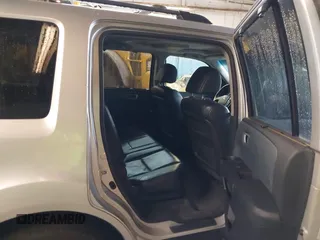 2009 Honda Pilot Touring with VIN 5FNYF48929B010331, listed as a IAAI auction lot 41965094 with 142,490 mi miles and . Bid and sale history available at carsss.com. Image 8.