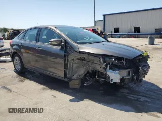 2016 Ford Focus SE with VIN 1FADP3F20GL250053, listed as a Copart auction lot 57134955 with 120,261 mi miles and Salvage title. Bid and sale history available at DreamBid. Image 4.
