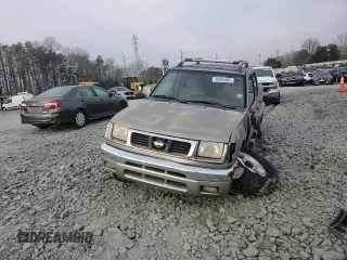 2000 Nissan Frontier XE with VIN 1N6ED27Y3YC366060, listed as a Copart auction lot 48955585 with 158,565 mi miles and Salvage title. Bid and sale history available at DreamBid. Image 10.