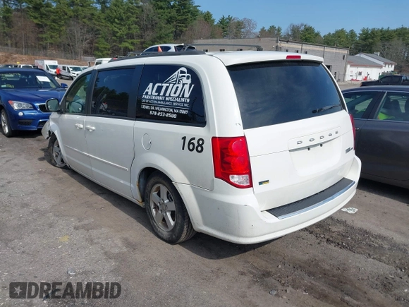 2012 Dodge Grand Caravan SXT with VIN 2C4RDGCGXCR358794, listed as a IAAI auction lot 42007316 with 212,518 mi miles and . Bid and sale history available at DreamBid. Image 3.
