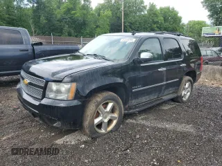 2010 Chevrolet Tahoe LTZ with VIN 1GNUKCE05AR164175, listed as a Copart auction lot 57223295 with 423,010 mi miles and Salvage title. Bid and sale history available at DreamBid. Image 1.