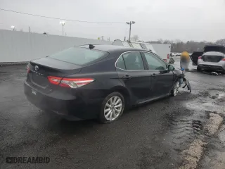 2019 Toyota Camry LE with VIN 4T1B11HK2KU222936, listed as a Copart auction lot 51669875 with 89,223 mi miles and Salvage Title. Bid and sale history available at carsss.com. Image 3.