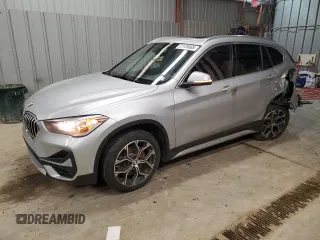 2021 BMW X1 xDrive28i with VIN WBXJG9C01M5T49891, listed as a Copart auction lot 51126685 with 93,696 mi miles and Clean Title. Bid and sale history available at carsss.com. Image 1.