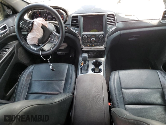 2018 Jeep Grand Cherokee Laredo E with VIN 1C4RJEAG1JC354221, listed as a Copart auction lot 58002715 with 108,223 mi miles and Salvage title. Bid and sale history available at DreamBid. Image 8.