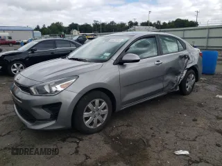 2021 Kia Rio S with VIN 3KPA24AD2ME401151, listed as a Copart auction lot 63223013 with 42,779 mi miles and Salvage Title. Bid and sale history available at DreamBid. Image 1.