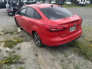 2016 Ford Focus SE with VIN 1FADP3F24GL403372, listed as a IAAI auction lot 42447728 with Not provided miles and . Bid and sale history available at DreamBid. Image 3.