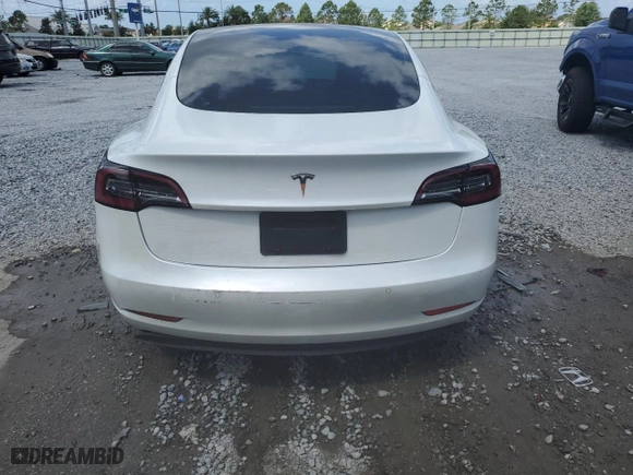 2021 Tesla Model 3 Standard Range Plus with VIN 5YJ3E1EA0MF920949, listed as a Copart auction lot 51477485 with 58,196 mi miles and Non Repairable. Bid and sale history available at carsss.com. Image 6.