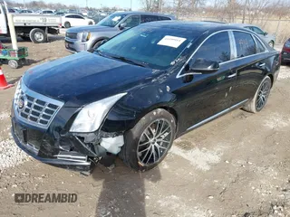2015 Cadillac XTS Luxury z VIN 2G61N5S35F9155543, wystawiony jako IAAI lot #41699914 z przebiegiem 120 700 mil mil oraz . Historia ofert i sprzedaży dostępna na DreamBid. Obrazek 19.