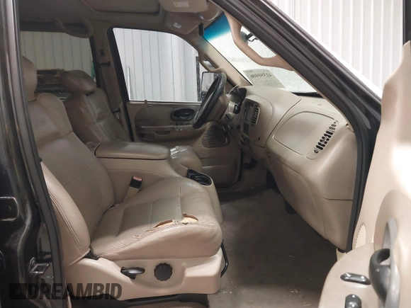 2002 Ford F-150 XLT with VIN 1FTRW08L62KC00490, listed as a IAAI auction lot 41380406 with 192,013 mi miles. Bid and sale history available at carsss.com. Image 5.