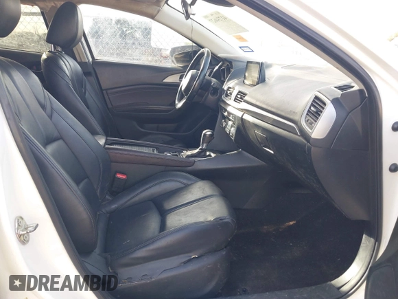 2017 Mazda 3 Touring with VIN 3MZBN1L77HM157118, listed as a IAAI auction lot 41734627 with 132,452 mi miles and . Bid and sale history available at DreamBid. Image 5.