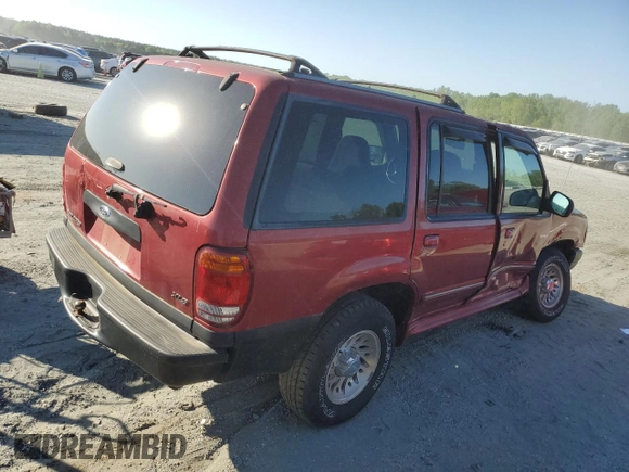 2000 Ford Explorer XLS z VIN 1FMZU72X7YUB64053, wystawiony jako Copart lot #53037485 z przebiegiem 197 312 mil mil oraz Szkody całkowita. Historia ofert i sprzedaży dostępna na DreamBid. Obrazek 3.
