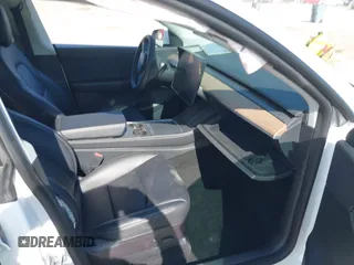 2022 Tesla Model Y Long Range with VIN 7SAYGDEE0NF340822, listed as a IAAI auction lot 41881224 with Not Provided miles and . Bid and sale history available at DreamBid. Image 5.