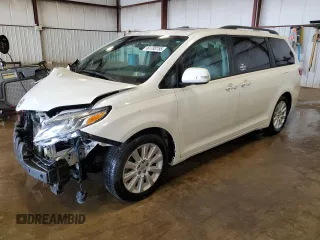 2015 Toyota Sienna XLE with VIN 5TDYK3DC4FS688299, listed as a Copart auction lot 61793155 with 57,197 mi miles and Salvage title. Bid and sale history available at DreamBid. Image 1.