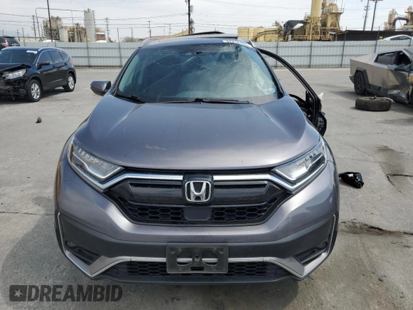2022 Honda CR-V Touring z VIN 7FARW2H96NE052072, wystawiony jako Copart lot #52214465 z przebiegiem 63 832 mil mil oraz Szkoda całkowita • Salvage title. Historia ofert i sprzedaży dostępna na DreamBid. Obrazek 5.