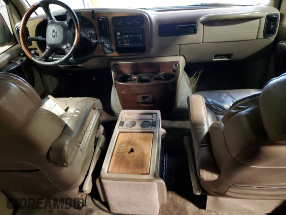 2002 Chevrolet Express z VIN 1GBFG15R921215686, wystawiony jako Copart lot #75614424 z przebiegiem Nie podano mil oraz Szkody całkowita. Historia ofert i sprzedaży dostępna na DreamBid. Obrazek 8.