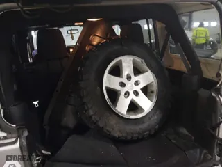 2017 Jeep Wrangler Unlimited Sport with VIN 1C4BJWDG5HL551406, listed as a IAAI auction lot 41618566 with 87,634 mi miles. Bid and sale history available at carsss.com. Image 12.
