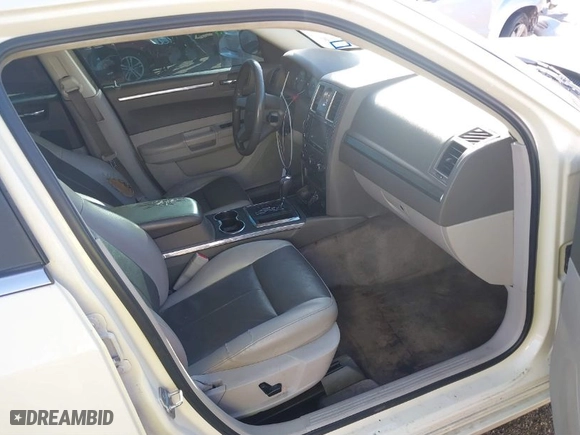 2008 Chrysler 300 Touring with VIN 2C3LA53G08H283303, listed as a IAAI auction lot 41680375 with 210,765 mi miles. Bid and sale history available at carsss.com. Image 5.