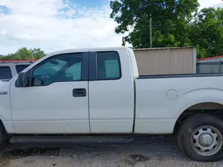 2011 Ford F-150 XL with VIN 1FTEX1CMXBFC21319, listed as a IAAI auction lot 42434901 with 192,889 mi miles and . Bid and sale history available at DreamBid. Image 14.