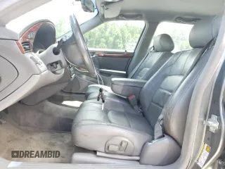 2005 Cadillac DeVille z VIN 1G6KD54Y65U205965, wystawiony jako Copart lot #58630405 z przebiegiem 129 448 mil mil oraz Czysty tytuł • Clean title. Historia ofert i sprzedaży dostępna na DreamBid. Obrazek 7.