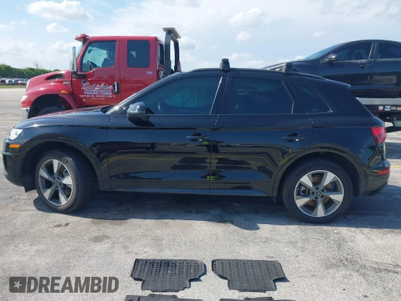 2020 Audi Q5 Premium with VIN WA1ANAFY2L2085872, listed as a IAAI auction lot 42354349 with 67,682 mi miles and . Bid and sale history available at DreamBid. Image 14.