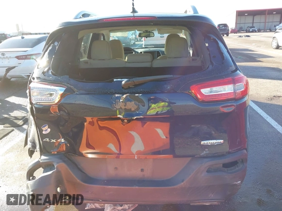 2015 Jeep Cherokee Latitude with VIN 1C4PJMCS0FW583658, listed as a IAAI auction lot 41106819 with 101,849 mi miles. Bid and sale history available at carsss.com. Image 16.