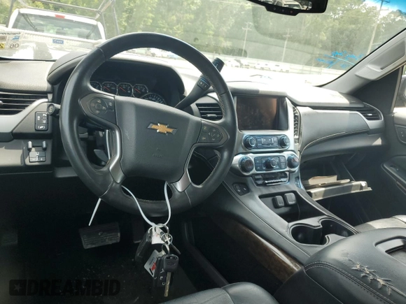 2015 Chevrolet Tahoe LT with VIN 1GNSCBKC1FR240186, listed as a Copart auction lot 64741425 with 110,357 mi miles and Salvage title. Bid and sale history available at DreamBid. Image 8.