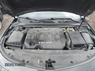 2014 Chevrolet Impala LT with VIN 2G1125S35E9303056, listed as a IAAI auction lot 42019162 with 190,427 mi miles and . Bid and sale history available at DreamBid. Image 10.