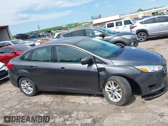 2018 Ford Focus SE with VIN 1FADP3F20JL312395, listed as a IAAI auction lot 42110335 with 110,720 mi miles and . Bid and sale history available at DreamBid. Image 13.