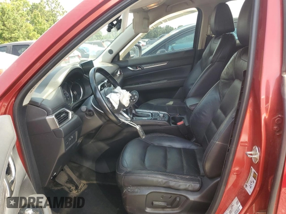 2018 Mazda CX-5 Grand Touring with VIN JM3KFADM9J0398036, listed as a Copart auction lot 62284145 with 118,827 mi miles and Salvage title. Bid and sale history available at DreamBid. Image 7.
