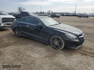 2015 Mercedes-Benz E-Class E 400 with VIN WDDKJ6FB6FF298535, listed as a Copart auction lot 44443655 with 64,305 mi miles and Salvage Title. Bid and sale history available at carsss.com. Image 4.