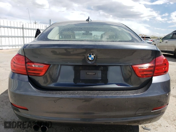 2015 BMW 4 Series 428i z VIN WBA4A5C53FG051038, wystawiony jako Copart lot #54909705 z przebiegiem 101 536 mil mil oraz Nie do naprawy • Non repairable. Historia ofert i sprzedaży dostępna na DreamBid. Obrazek 6.