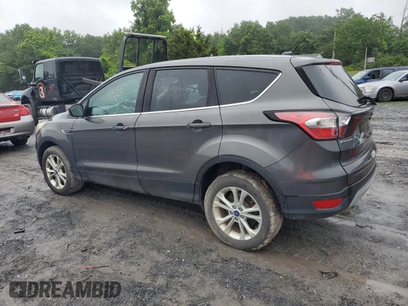 2017 Ford Escape SE z VIN 1FMCU9GD4HUE68604, wystawiony jako Copart lot #61170775 z przebiegiem 152 286 mil mil oraz Czysty tytuł • Clean title. Historia ofert i sprzedaży dostępna na DreamBid. Obrazek 2.