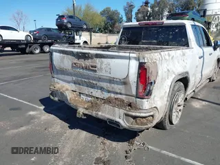 2022 GMC Sierra 1500 with VIN 3GTUUGETXNG640009, listed as a IAAI auction lot 41626847 with 43,537 mi miles and . Bid and sale history available at DreamBid. Image 12.