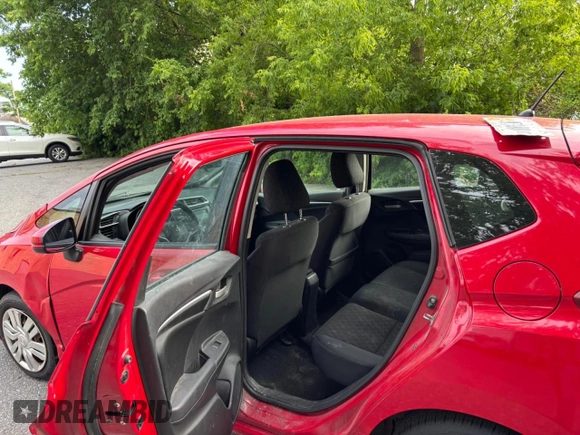 2015 Honda Fit LX with VIN 3HGGK5H50FM760104, listed as a Copart auction lot 63164915 with 118,328 mi miles and Clean title. Bid and sale history available at DreamBid. Image 6.