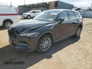2020 Mazda CX-5 Grand Touring with VIN JM3KFBDMXL1735154, listed as a Copart auction lot 49313585 with 82,750 mi miles and Salvage Title. Bid and sale history available at DreamBid. Image 1.