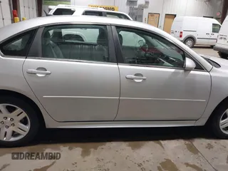 2014 Chevrolet Impala LT with VIN 2G1WB5E37E1178089, listed as a IAAI auction lot 42450127 with 58,277 mi miles and . Bid and sale history available at DreamBid. Image 13.
