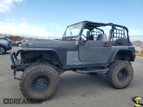 1990 Jeep Wrangler with VIN 2J4FY29T5LJ537896, listed as a Copart auction lot 57021295 with 143,753 mi miles and Clean title. Bid and sale history available at DreamBid. Image 1.