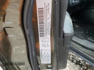 2015 Jeep Cherokee Latitude z VIN 1C4PJMCS7FW515406, wystawiony jako Copart lot #52331155 z przebiegiem 129 815 mil mil oraz Szkoda całkowita • Salvage title. Historia ofert i sprzedaży dostępna na DreamBid. Obrazek 14.