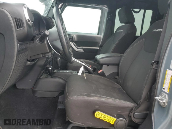 2015 Jeep Wrangler Unlimited Rubicon with VIN 1C4BJWFG7FL674201, listed as a Copart auction lot 49466455 with 0 mi miles and Salvage Title. Bid and sale history available at carsss.com. Image 7.