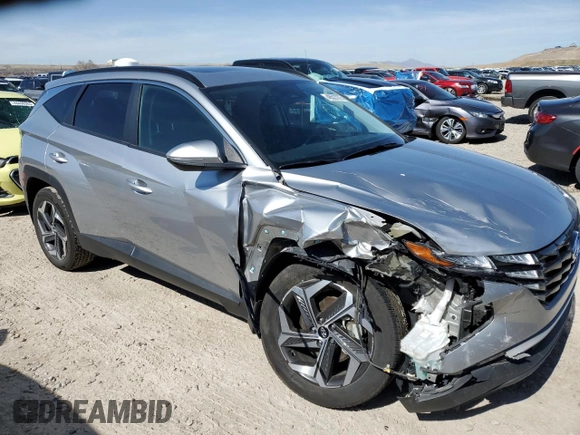 2022 Hyundai Tucson SEL with VIN 5NMJFCAE7NH089359, listed as a Copart auction lot 48527075 with 73,938 mi miles and Salvage Title. Bid and sale history available at DreamBid. Image 4.