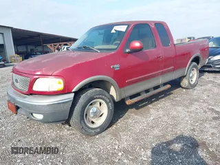 2001 Ford F-150 XL with VIN 1FTRX18L41KF38469, listed as a IAAI auction lot 41954075 with 219,967 mi miles. Bid and sale history available at carsss.com. Image 2.