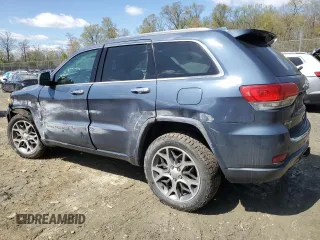 2020 Jeep Grand Cherokee Overland with VIN 1C4RJFCG7LC335839, listed as a Copart auction lot 52320505 with 86,684 mi miles and Salvage Title. Bid and sale history available at DreamBid. Image 2.