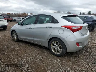 2013 Hyundai Elantra GT with VIN KMHD35LEXDU061377, listed as a Copart auction lot 79476674 with 123,503 mi miles and Salvage Title. Bid and sale history available at carsss.com. Image 2.