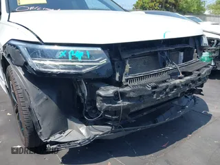 2022 Volkswagen Tiguan SE R-Line Black z VIN 3VVCB7AX1NM078210, wystawiony jako IAAI lot #42374836 z przebiegiem 37 774 mil mil oraz . Historia ofert i sprzedaży dostępna na DreamBid. Obrazek 18.