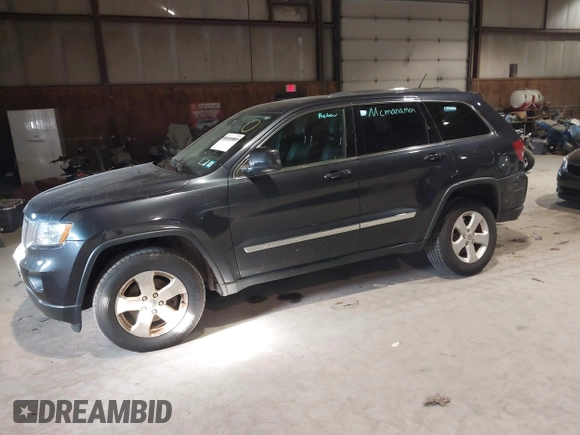 2013 Jeep Grand Cherokee Laredo with VIN 1C4RJFAG9DC583269, listed as a IAAI auction lot 41241085 with 147,995 mi miles. Bid and sale history available at carsss.com. Image 18.