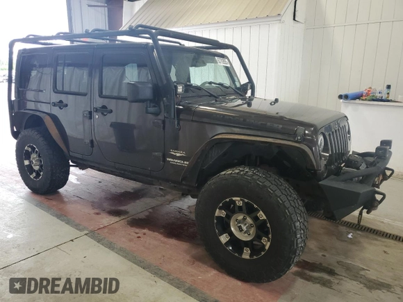 2013 Jeep Wrangler Unlimited Sahara with VIN 1C4HJWEG0DL658138, listed as a Copart auction lot 63792855 with Not provided miles and Clean title. Bid and sale history available at DreamBid. Image 4.