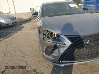 2021 Lexus NX 300 F Sport z VIN JTJSARBZ1M2193319, wystawiony jako IAAI lot #41876755 z przebiegiem 30 332 mil mil oraz . Historia ofert i sprzedaży dostępna na DreamBid. Obrazek 6.