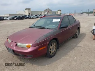 2002 Saturn SL z VIN 1G8ZF52802Z248375, wystawiony jako IAAI lot #42180352 z przebiegiem Nie podano mil oraz . Historia ofert i sprzedaży dostępna na DreamBid. Obrazek 6.