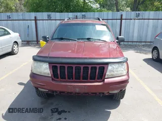 1999 Jeep Grand Cherokee Limited with VIN 1J4GW68S9XC653855, listed as a IAAI auction lot 42433370 with 275,724 mi miles and . Bid and sale history available at DreamBid. Image 6.